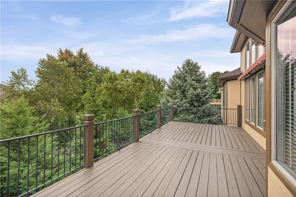 Mature trees, corner lot and flat lot at 20306 W 99th Terrace, Lenexa, KS 66220