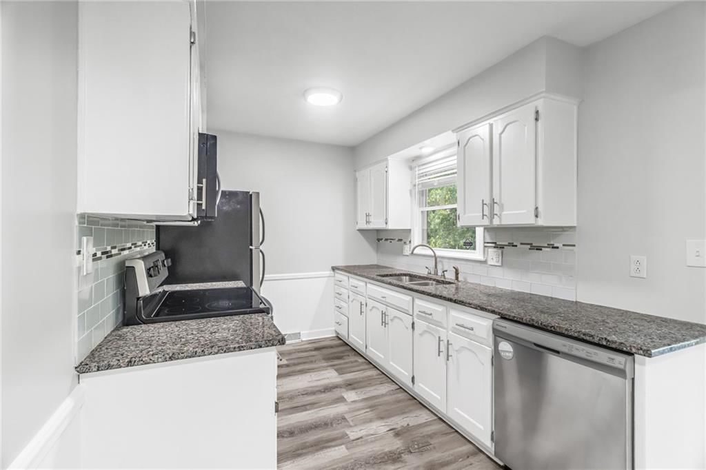 7644 NW Milrey Drive — photo 12