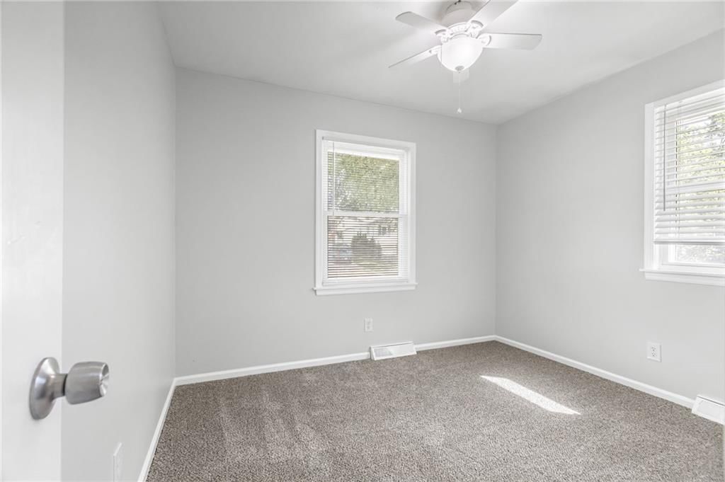 7644 NW Milrey Drive — photo 18