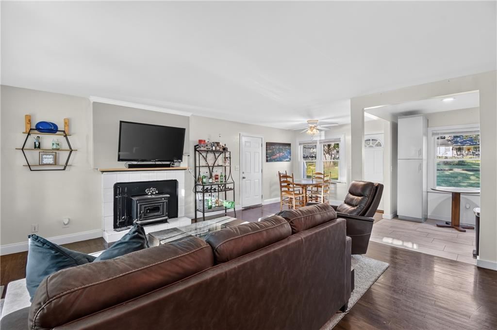 Fireplace and open floor plan at 4515 Crisp Avenue, Kansas City, MO 64133