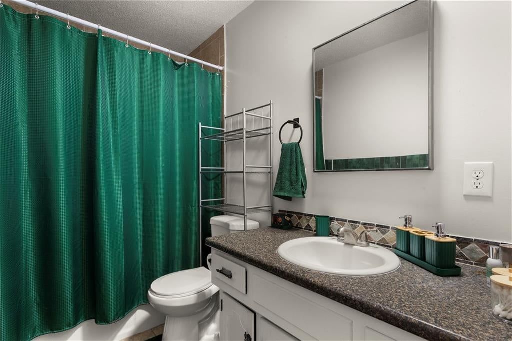 Renovated bathrooms at 8435 E 56th Terrace, Kansas City, MO 64129