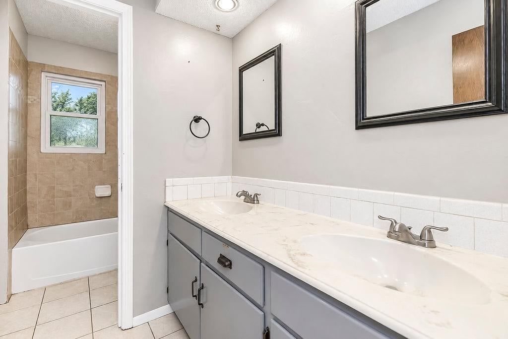 Double vanity and gray vanity at 20213 E 16th Street N, Independence, MO 64056