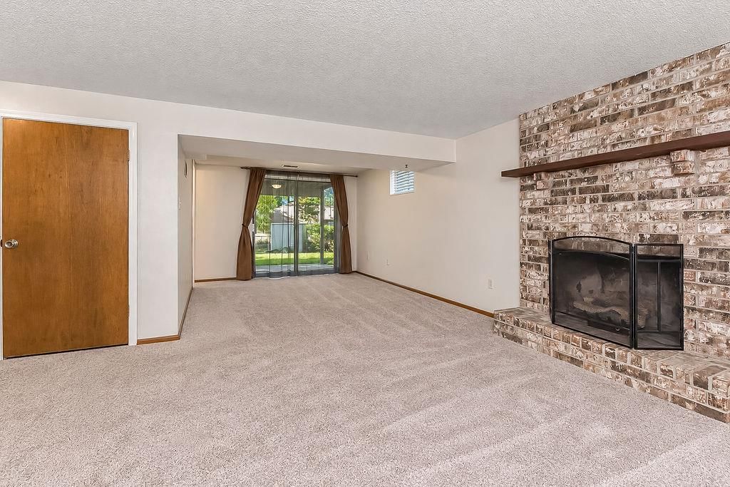 Finished basement and fireplace at 20213 E 16th Street N, Independence, MO 64056