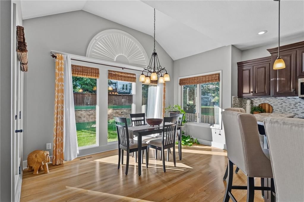 Fenced yard and breakfast nook at 8614 Houston Street, Lenexa, KS 66227