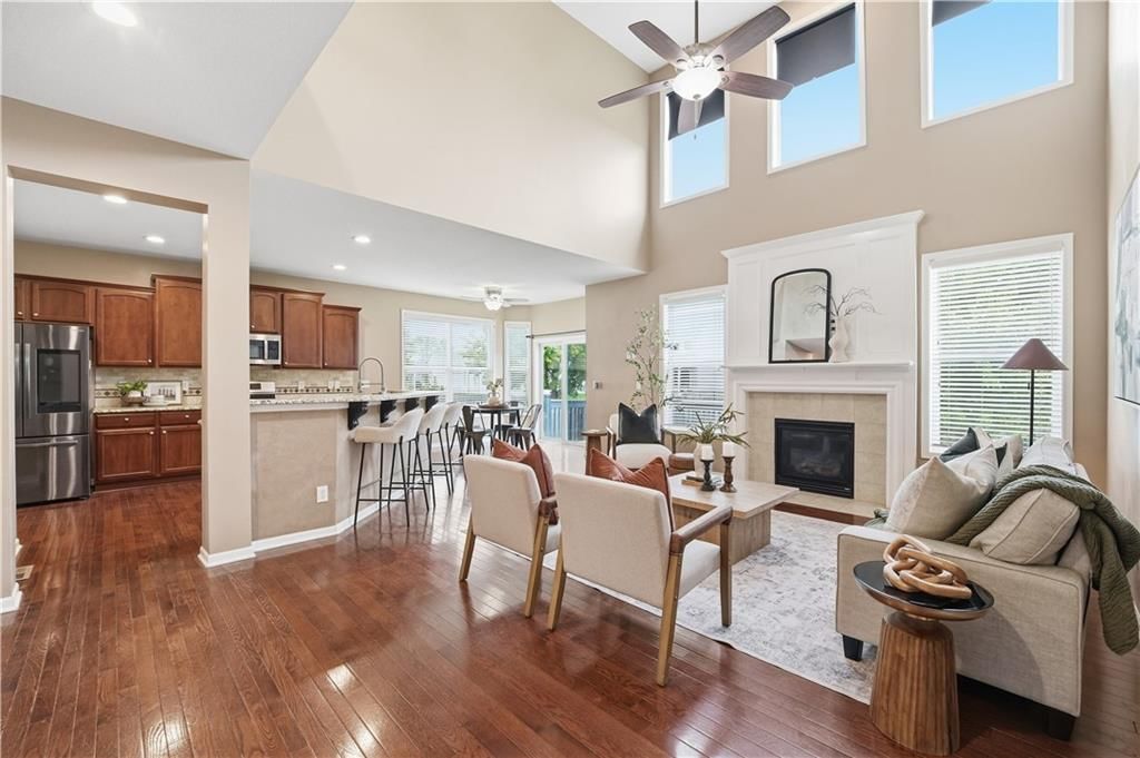 Tall ceilings, fireplace and open floor plan at 1200 SW Sapperton Road, Lee's Summit, MO 64083