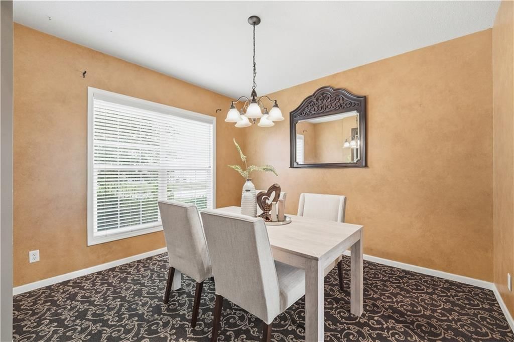 Home office and statement lighting at 1200 SW Sapperton Road, Lee's Summit, MO 64083