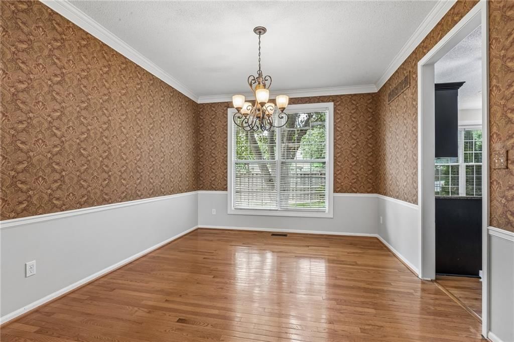 Statement lighting and wainscoting or board and batten at 8925 W 132nd Terrace, Overland Park, KS 66213