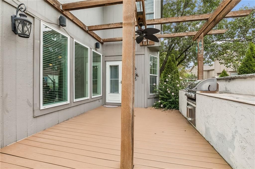 Deck, big backyard and pergola at 8925 W 132nd Terrace, Overland Park, KS 66213