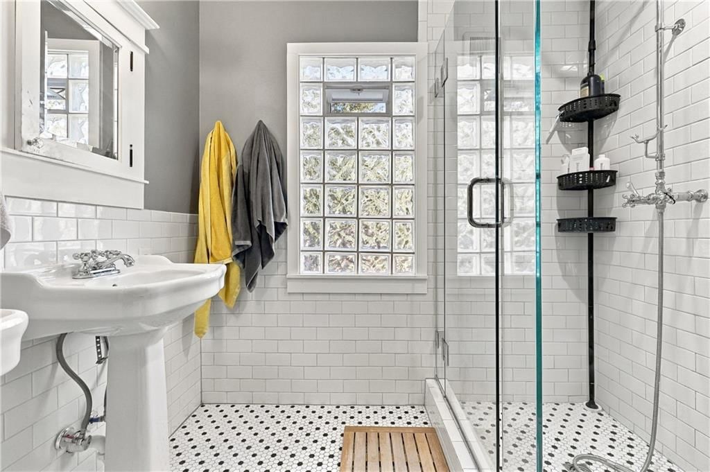 Walk-in shower, tiled shower and frameless glass shower at 5532 Knox Avenue, Merriam, KS 66203