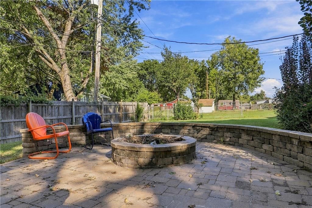 Big backyard and mature trees at 5532 Knox Avenue, Merriam, KS 66203