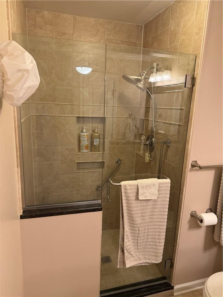 Walk-in shower, tiled shower and frameless glass shower at 1917 Thornton Street, Leavenworth, KS 66048