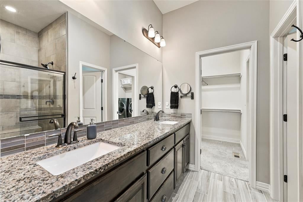Walk-in shower and tiled shower at 12073 S Pine Street, Olathe, KS 66061