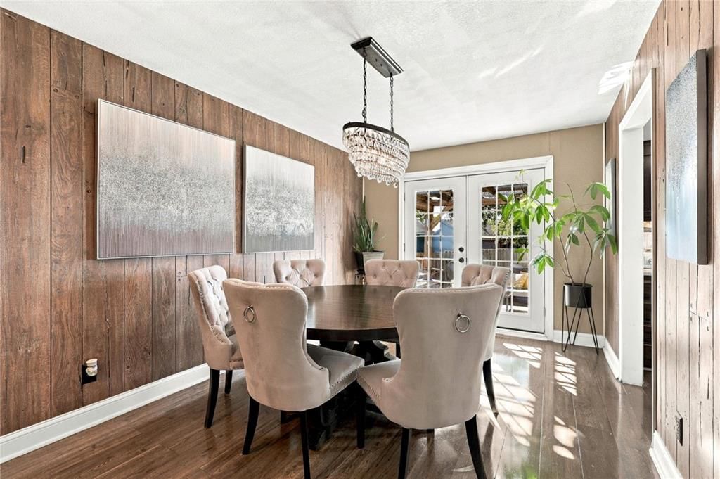 Statement lighting and shiplap / paneling at 205 NW 101st Place, Kansas City, MO 64155