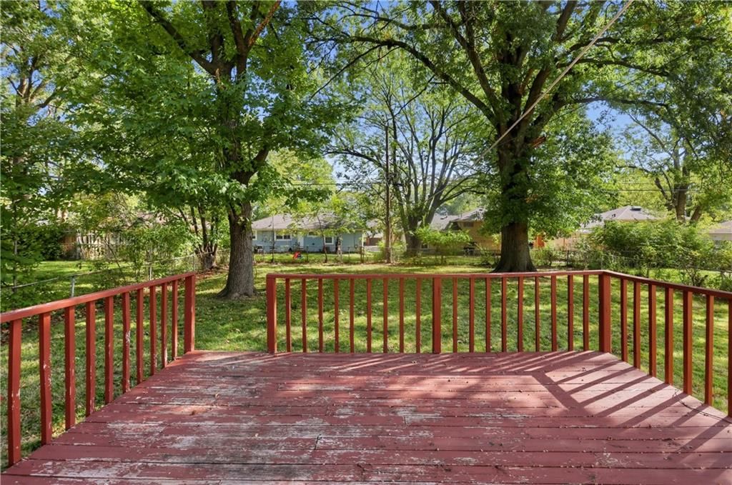 Deck, big backyard and fenced yard at 11727 FREMONT Avenue, Kansas City, MO 64134