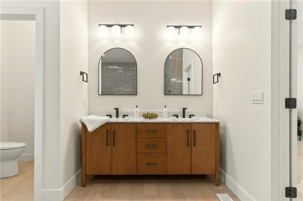 Freestanding tub, double vanity and wood vanity at 1701 NW Duncan Road, Blue Springs, MO 64015