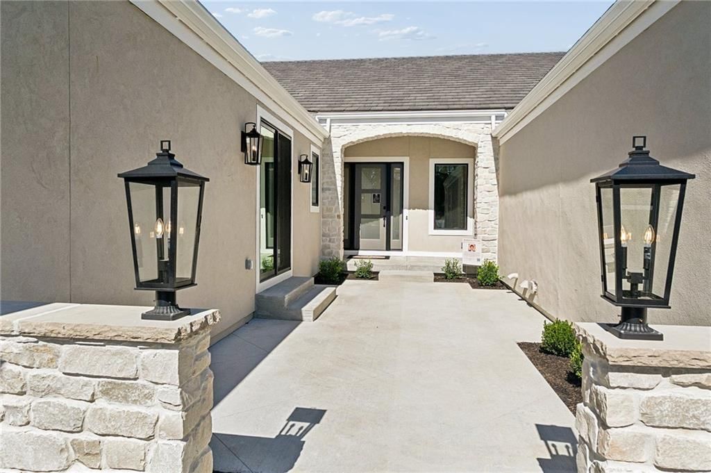 Concrete patio at 13725 Pembroke Lane, Leawood, KS 66224