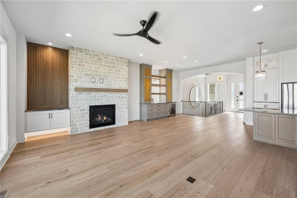 Fireplace and stone fireplace at 13725 Pembroke Lane, Leawood, KS 66224