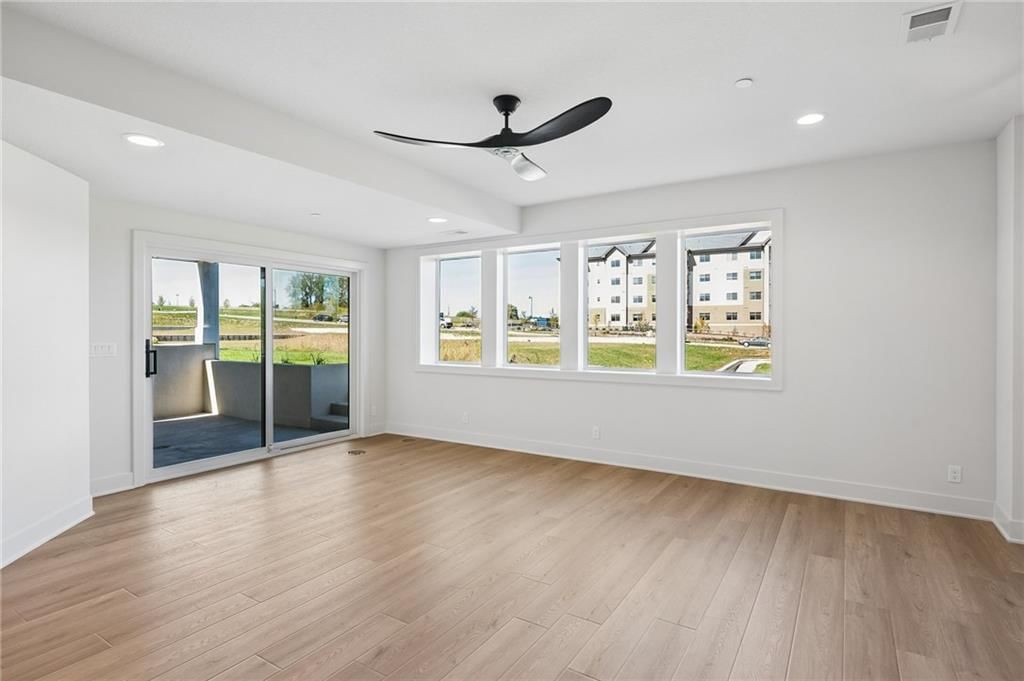 Screened porch and covered patio at 13725 Pembroke Lane, Leawood, KS 66224