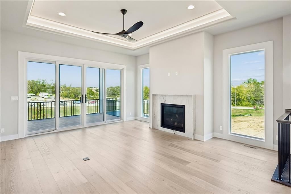 Tall ceilings, hardwood floors and tray ceiling at 13727 Pembroke Lane, Leawood, KS 66224
