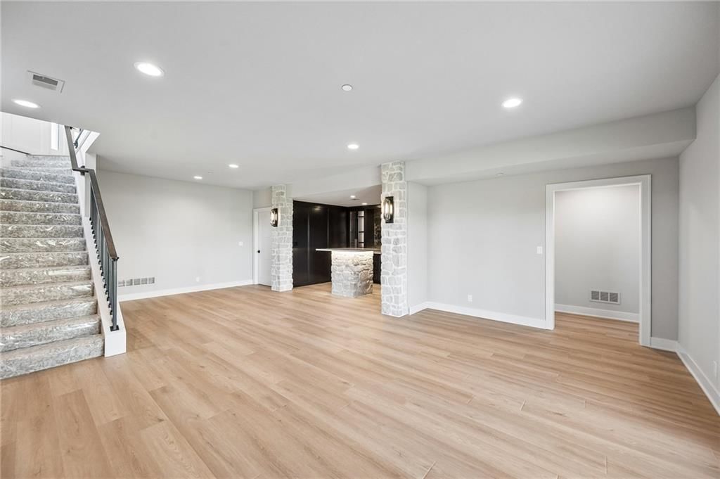 Finished basement and wet bar at 13727 Pembroke Lane, Leawood, KS 66224