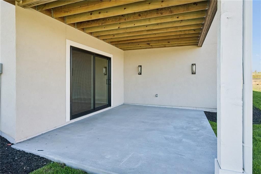 Concrete patio at 13727 Pembroke Lane, Leawood, KS 66224