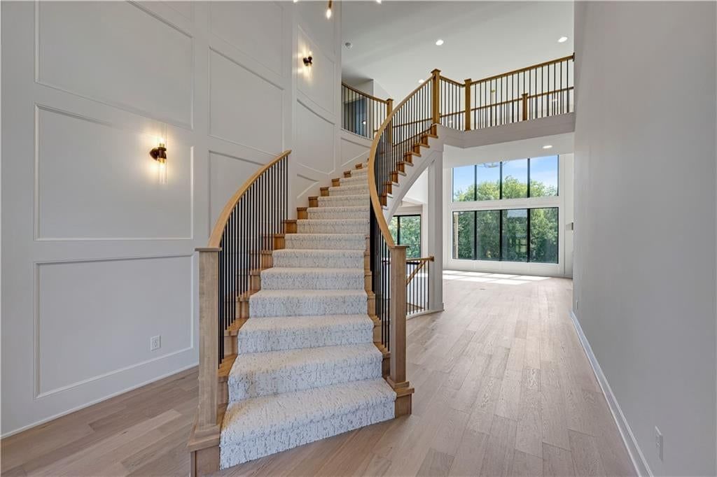 Hardwood floors, wainscoting or board and batten and shiplap / paneling at 11806 W 181st Terrace, Overland Park, KS 66013
