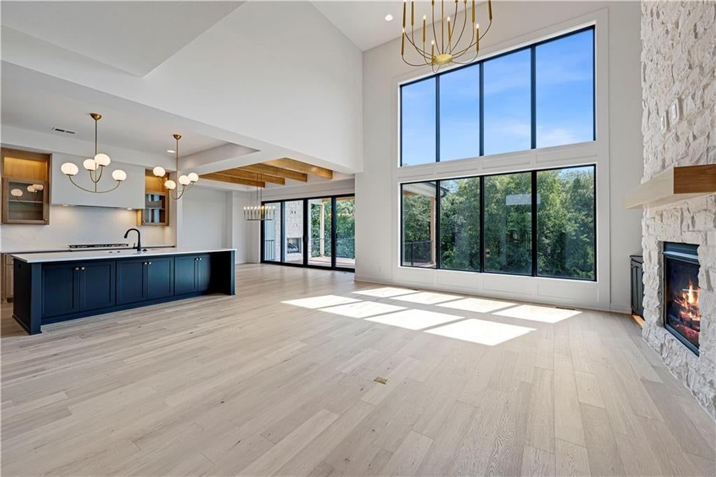 Tall ceilings, fireplace and open floor plan at 11806 W 181st Terrace, Overland Park, KS 66013