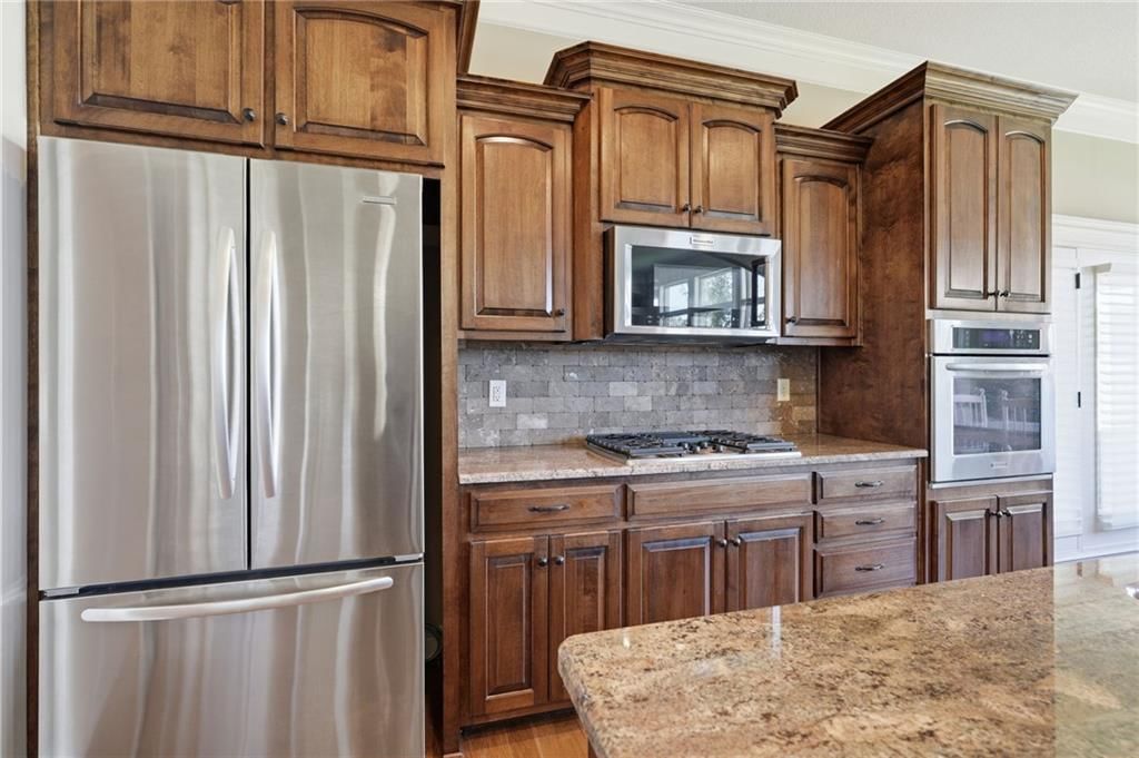 Photo 7 of 40 - 1510 Spur Ridge Circle, Raymore, MO 64083