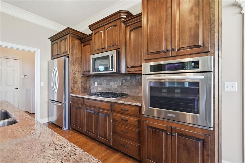 Photo 9 of 40 - 1510 Spur Ridge Circle, Raymore, MO 64083