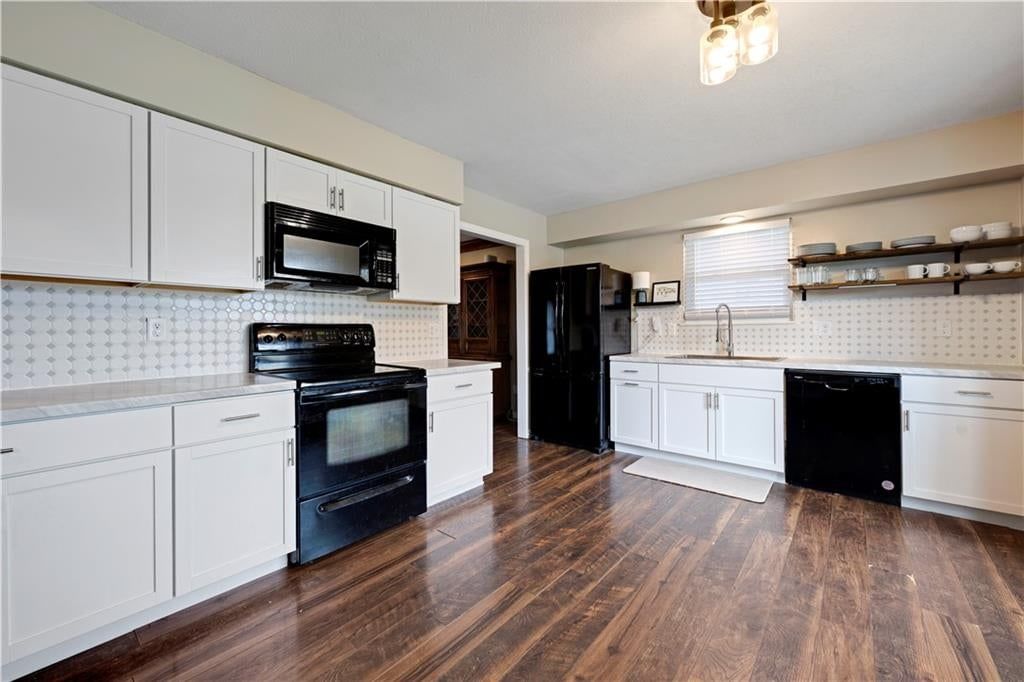 Photo 3: white kitchen cabinets, 16010 Harris Avenue, Belton, MO 64012