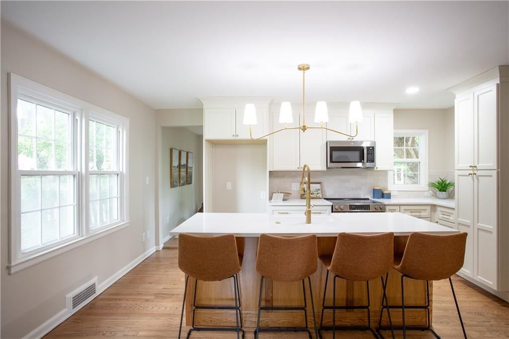Photo 8: white kitchen cabinets, 5612 Birch Street, Roeland Park, KS 66205
