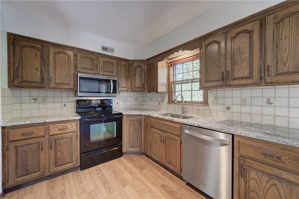 Gray countertops at 5712 Long Avenue, Shawnee, KS 66216