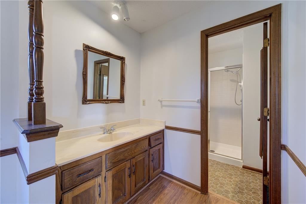 Walk-in shower, tiled shower and recessed lighting at 5712 Long Avenue, Shawnee, KS 66216
