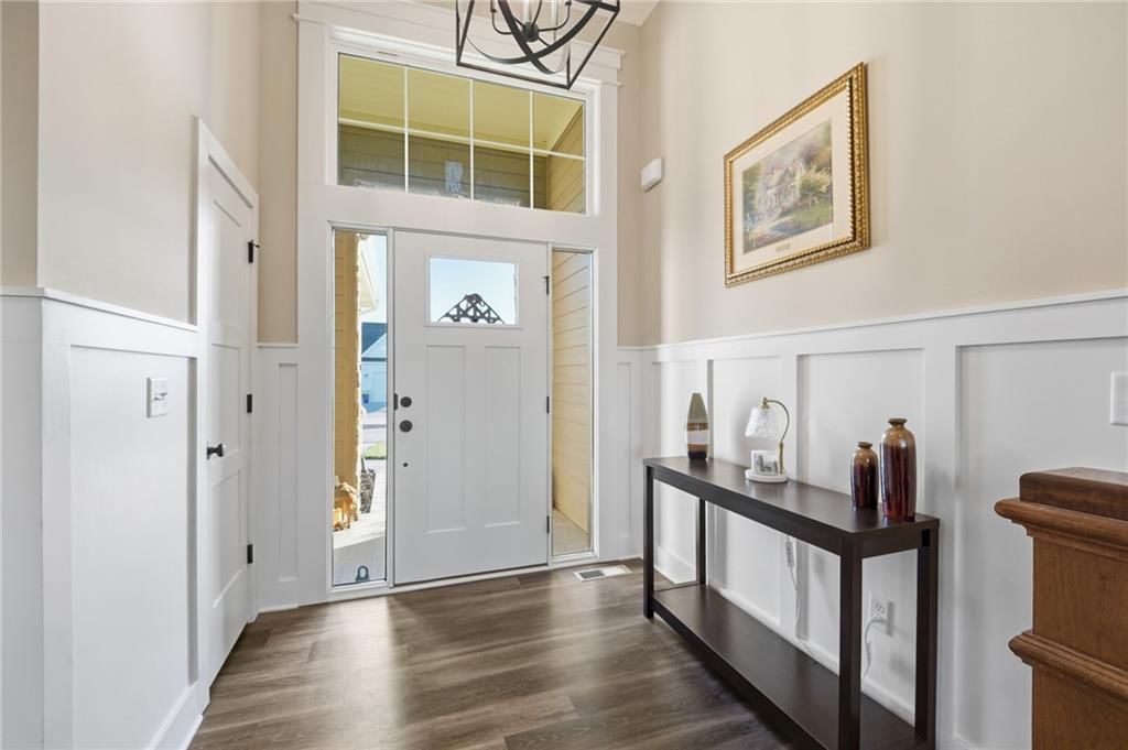 Luxury vinyl floors, wainscoting or board and batten and shiplap / paneling at 4372 Aspen Drive, Basehor, KS 66007