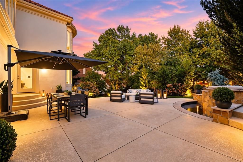 Big backyard, fenced yard and mature trees at 12707 Woodson Street, Overland Park, KS 66209
