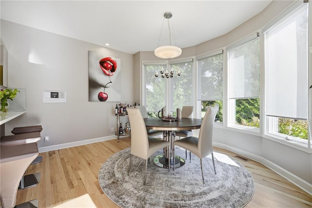 Wall of windows and breakfast nook at 12707 Woodson Street, Overland Park, KS 66209