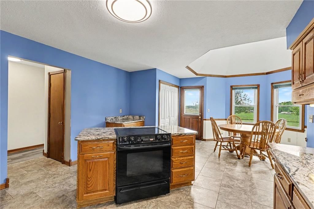 Tile floors and breakfast nook at 26503 283rd Street, Harrisonville, MO 64701