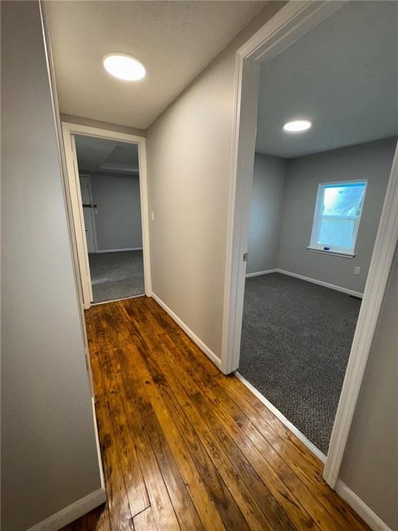 Main-floor primary bedroom and black hardware at 1003 E 83RD Terrace, Kansas City, MO 64131