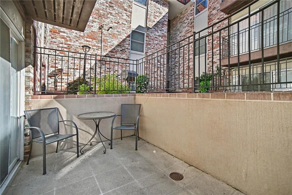 Concrete patio at 5004 Baltimore Avenue #103, Kansas City, MO 64112