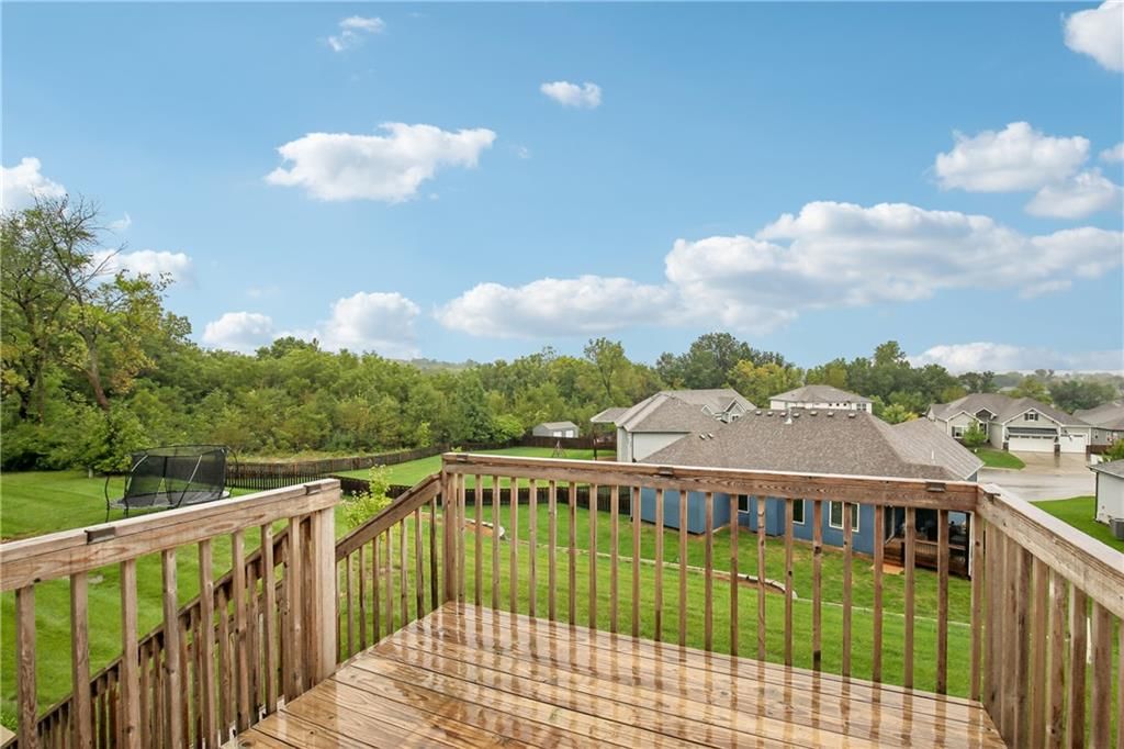 Deck, wood deck and flat lot at 1208 NW Hilltop Lane, Grain Valley, MO 64029