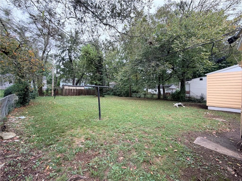 Big backyard, fenced yard and mature trees at 3004 E Meyer Boulevard, Kansas City, MO 66418