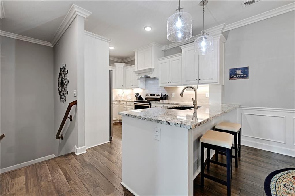 Photo 10: white kitchen cabinets, 16001 Granada Street #230, Stilwell, KS 66085