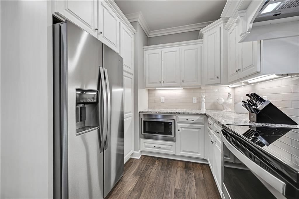 Photo 12: stainless steel appliances, 16001 Granada Street #230, Stilwell, KS 66085