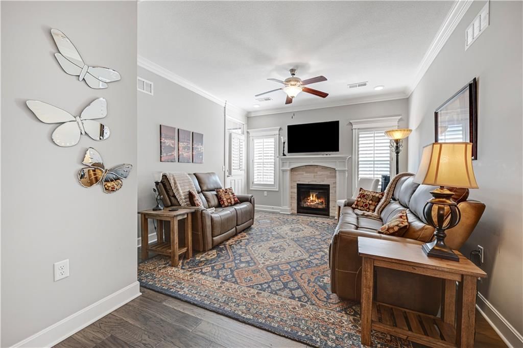 Fireplace and open floor plan at 16001 Granada Street #230, Stilwell, KS 66085