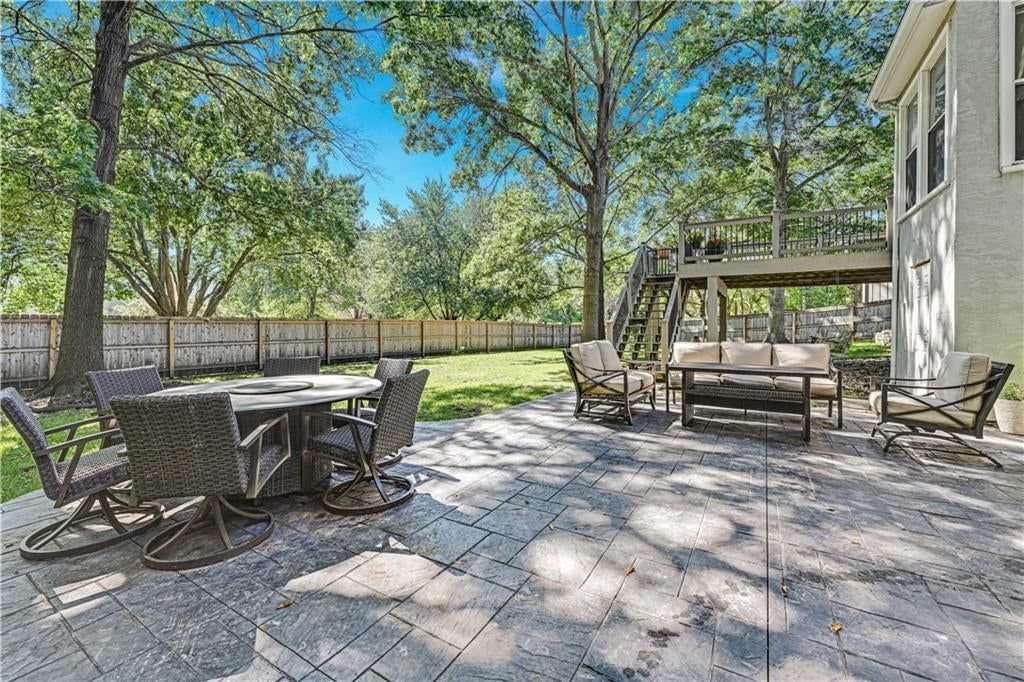 Big backyard, fenced yard and mature trees at 12432 Perry Street, Overland Park, KS 66213