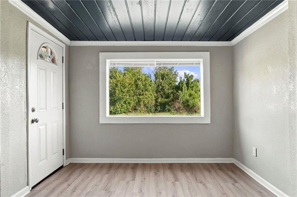 Black hardware and white trim at 15023 E Truman Road, Independence, MO 64050