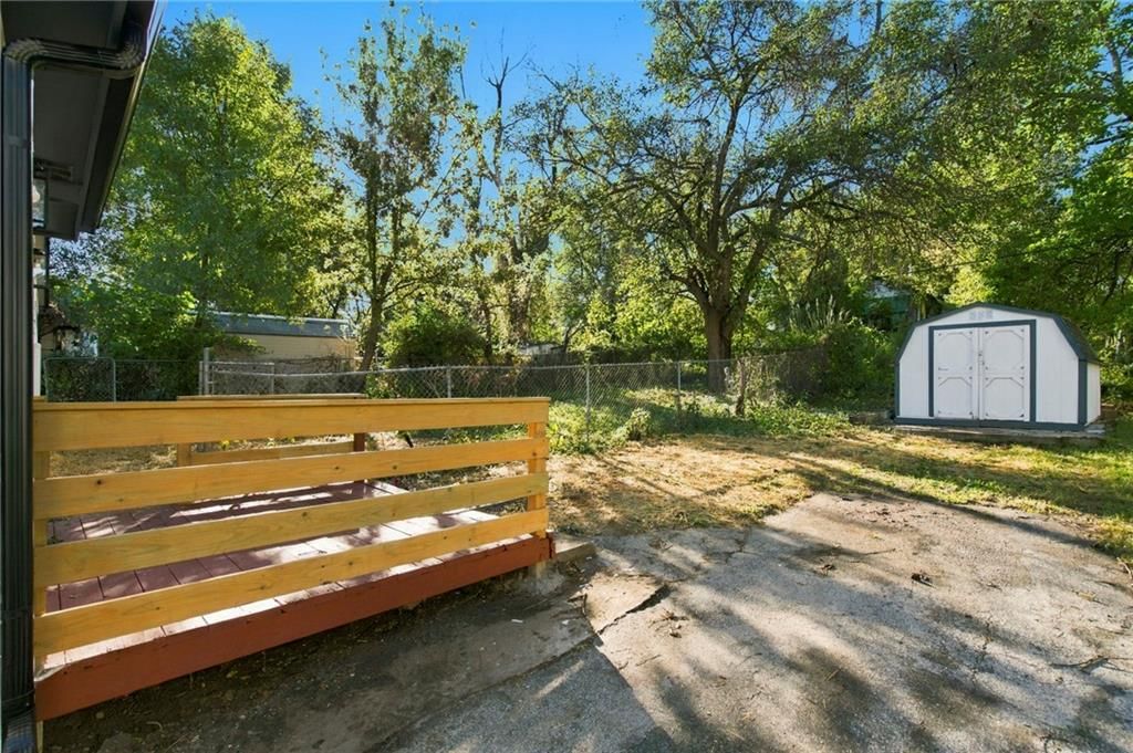 Deck and fenced yard at 15023 E Truman Road, Independence, MO 64050