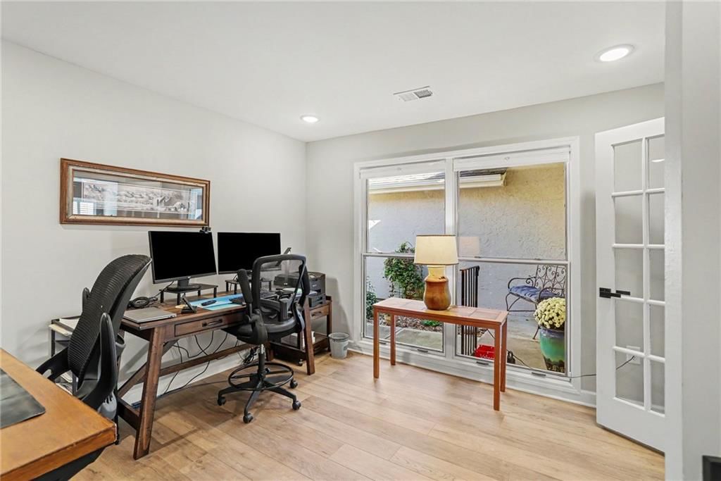 Home office and black hardware at 12201 Caenen Drive, Overland Park, KS 66213