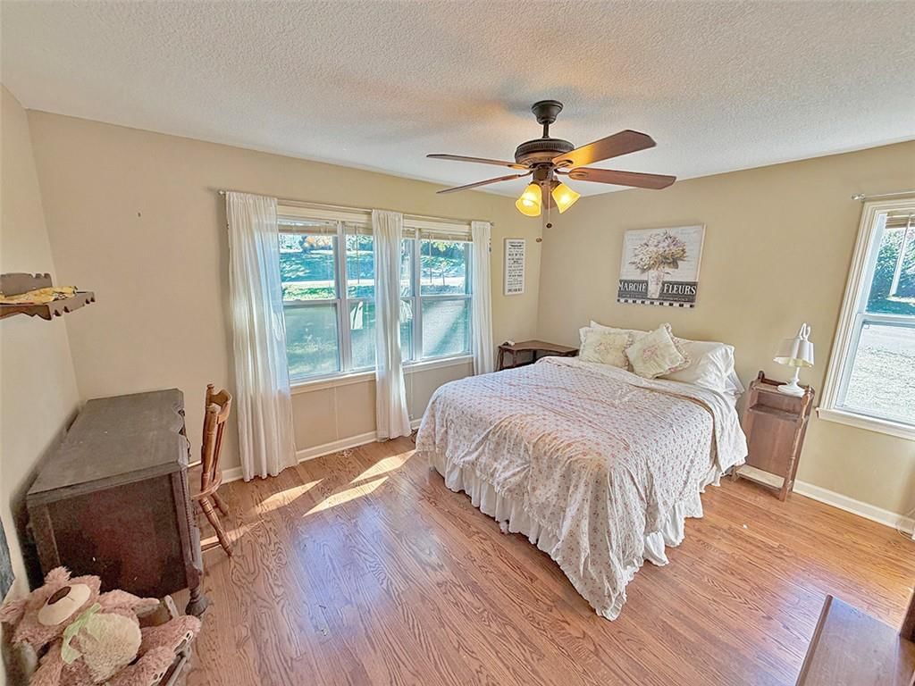Main-floor primary bedroom at 3690 S Crysler Avenue, Independence, MO 64055