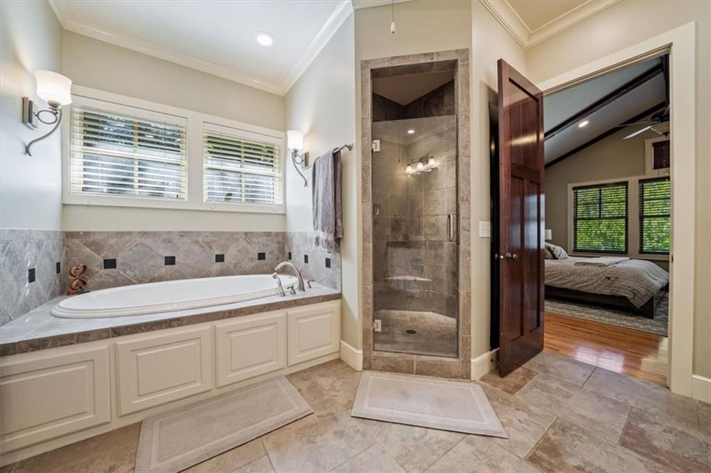 Tile floors and private toilet room at 14204 Bluejacket Street, Overland Park, KS 66221
